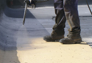 Coating systems over Indianapolis spray foam roof systems